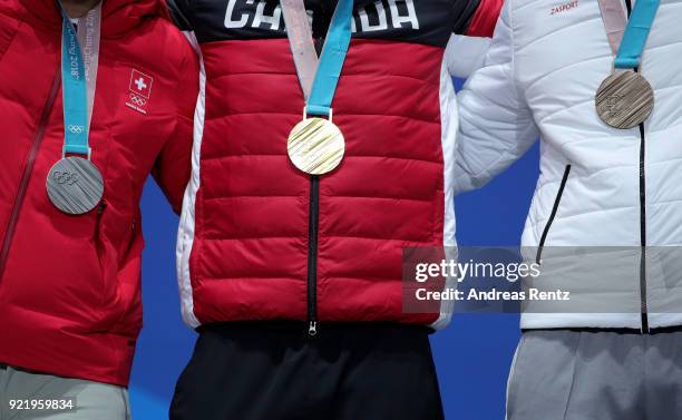Silver medalist Marc Bischofberger of Switzerland, gold medalist Brady Leman of Canada and bronze medalist Sergey Ridzik of Olympic athletes of...
