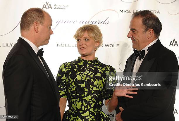 Prince Albert II of Monaco, actress Martha Plimpton and actor Mandy Patinkin attend The Princess Grace Awards Gala at Cipriani 42nd Street on October...