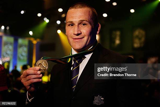 Matt Giteau of Australia and winner of the 2009 John Eales Medal poses for a photograph during the John Eales Medal Dinner at the Carriage Works on...