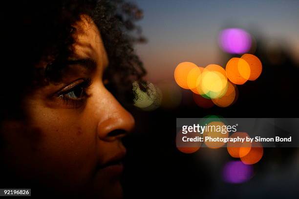 woman with light dots at night - suncheon stock pictures, royalty-free photos & images