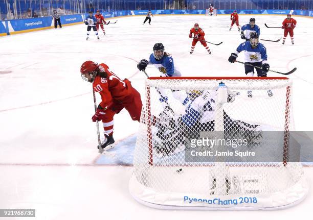 Lyudmila Belyakova of Olympic Athlete from Russia scores a goal against Noora Raty of Finland in the third period during the Women's Ice Hockey...
