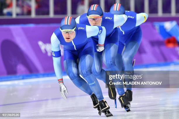 South Korea's Joo Hyong-Jun, South Korea's Lee Seung-Hoon and South Korea's Kim Min Seok competes in the men's team pursuit semi-final speed skating...