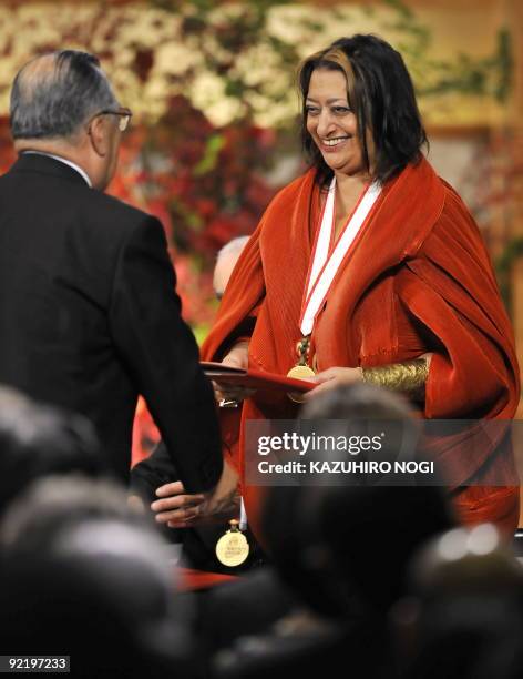 Iraqi-born British architect Zaha Hadid receives an award recognising her achievments in architecture during the 21st Praemium Imperiale award...