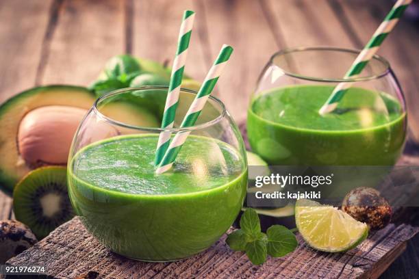 fresh homemade green smoothie - cucumber cocktail stock pictures, royalty-free photos & images