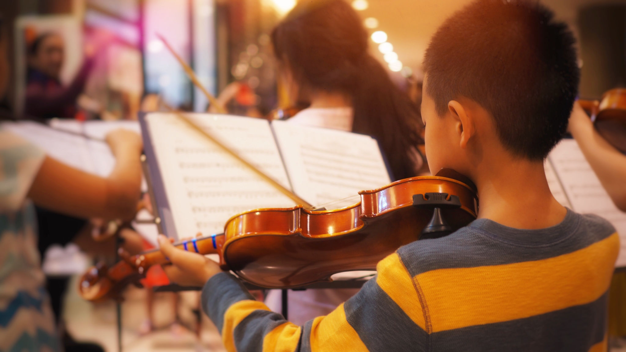 child playing violin
