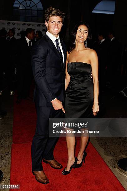 Berrick Barnes and partner Rebecca Spratt pose for a photograph during the John Eales Medal Dinner at the Carriage Works on October 22, 2009 in...