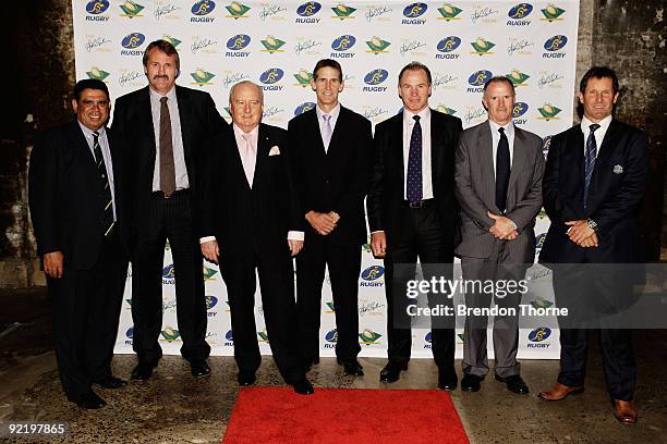 The 1984 Grand Slam Wallabies Mark Ella, Steve Williams, Alan Jones, Roger Gould, Simon Poidevin, Andrew Slack and Wallabies coach Robbie Deans pose...