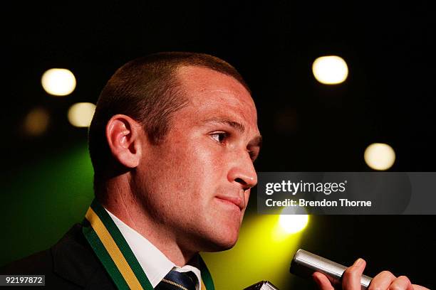 Matt Giteau of Australia and winner of the 2009 John Eales Medal talks with the media during the John Eales Medal Dinner at the Carriage Works on...