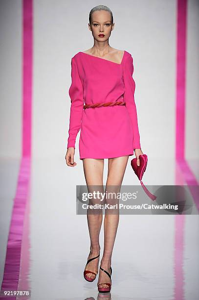 Model walks the runway during the Emanuel Ungaro fashion show as part of the Paris Womenswear Fashion Week Spring/Summer 2010 at Le Carrousel du...