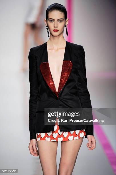 Model walks the runway during the Emanuel Ungaro fashion show as part of the Paris Womenswear Fashion Week Spring/Summer 2010 at Le Carrousel du...