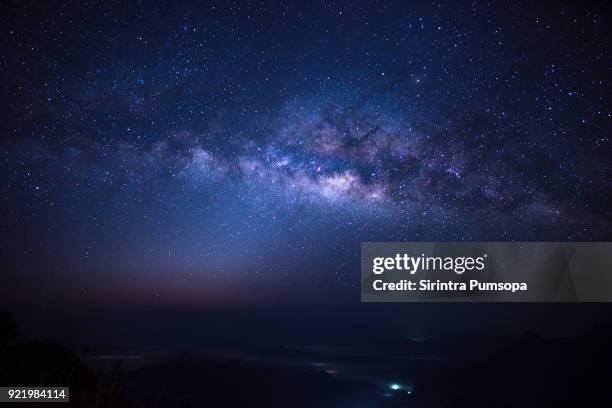 milky way over phu chi fa mountain in chiang rai province, thailand - rocky star stock pictures, royalty-free photos & images