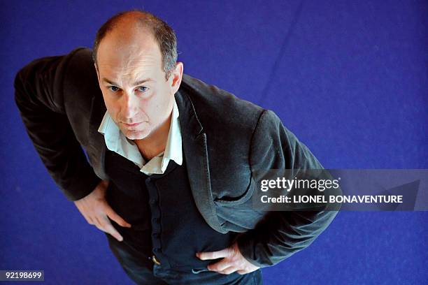 French illustrator Blutch poses on October 15, 2009 in Bobigny near Paris during a ceremony, as part of the "Droles de Gaulois" event, to honour...