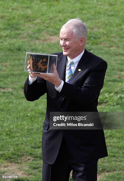 John Furlong, chief Executive Officer of VANOC , holds a pot during the Ceremony of the Lighting of the Olympic Flame for the Vancouver 2010 Winter...