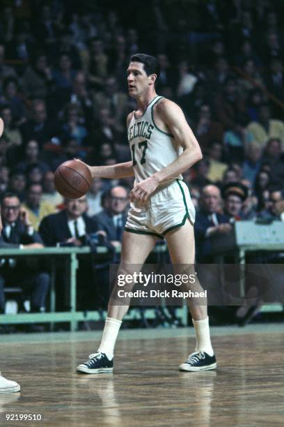 John Havlicek of the Boston Celtics moves the ball up court during a game played in 1967 at the Boston Garden in Boston, Massachusetts. NOTE TO USER:...