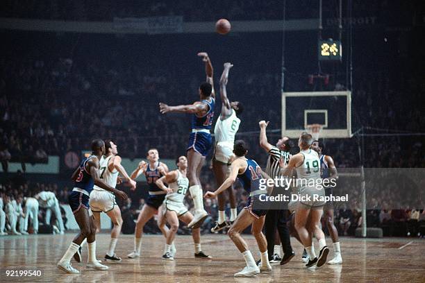 Bill Russell of the Boston Celtics battles for the jump ball against Wilt Chamberlain of the Philadelphia 76ers during a game played in 1967 at the...