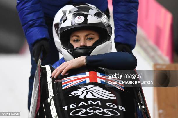 Britain's Mica Mcneill and Britain's Mica Moore compete in the women's bobsleigh heat 3 run during the Pyeongchang 2018 Winter Olympic Games at the...