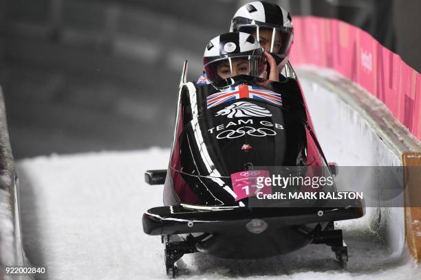 Britain's Mica Mcneill and Britain's Mica Moore compete in the women's bobsleigh heat 3 run during the Pyeongchang 2018 Winter Olympic Games at the...