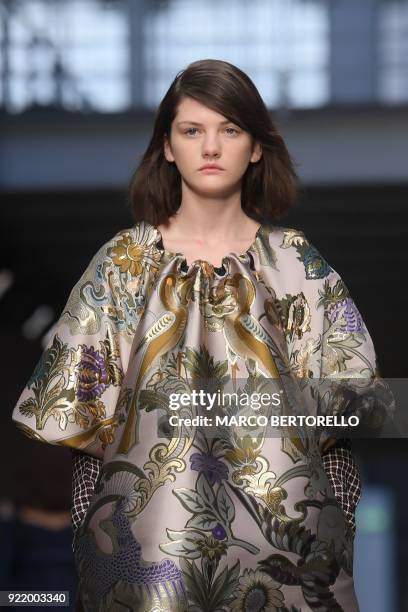 Model presents a creation by Albino Teodoro during the women's Fall/Winter 2018/2019 collection fashion show in Milan, on February 21, 2018. / AFP...