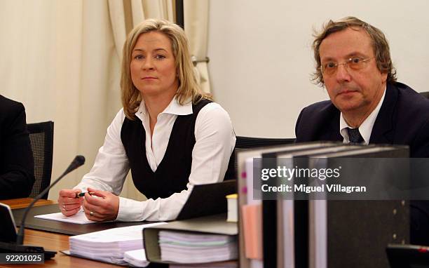 Olympic speed skating champion Claudia Pechstein and her lawyer Christian Kraehe look on at the court of Arbitration for Sport on October 22, 2009 in...