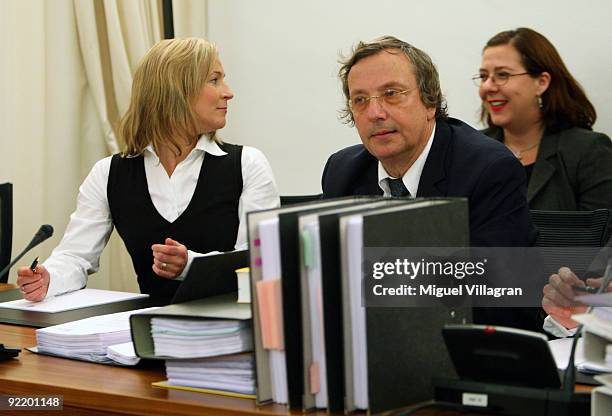 Olympic speed skating champion Claudia Pechstein and her lawyer Christian Kraehe are pictured at the court of Arbitration for Sport on October 22,...