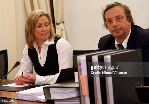 Olympic speed skating champion Claudia Pechstein and her lawyer Christian Kraehe look on at the court of Arbitration for Sport on October 22, 2009 in...