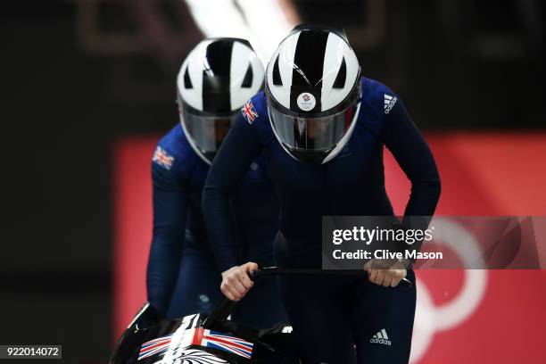 Mica Mcneill and Mica Moore of Great Britain slide during the Women's Bobsleigh heats on day twelve of the PyeongChang 2018 Winter Olympic Games at...