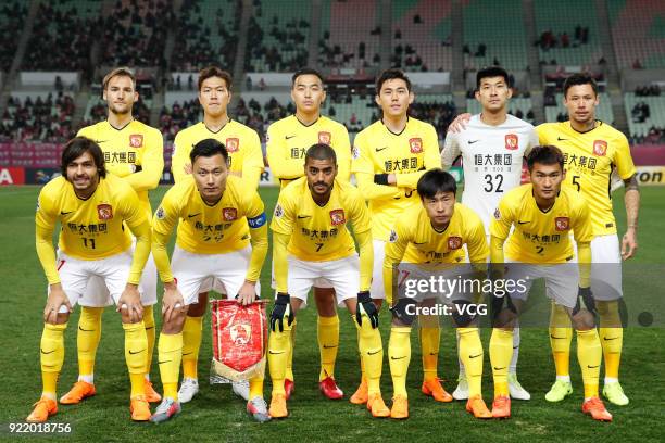 Players of Guangzhou Evergrande line up prior to the AFC Champions League Group G match between Cerezo Osaka and Guangzhou Evergrande at the Yanmar...