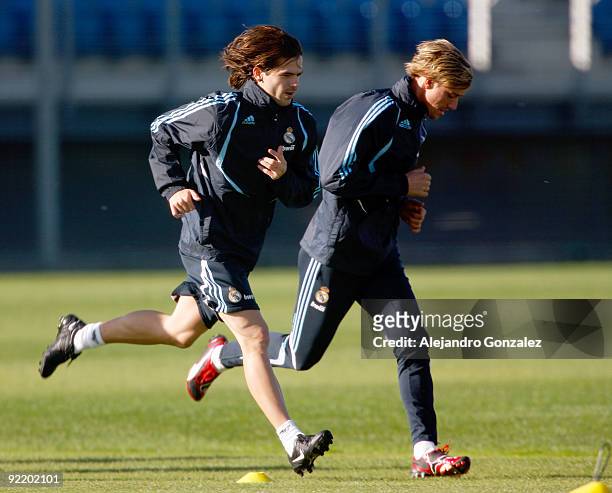 Fernando Gago and Guti runs during a Real Madrid training session at Valdebebas on October 22, 2009 in Madrid, Spain.