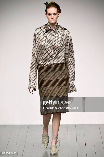 Model walks the runway at the Faustine Steinmetz Ready to Wear Fall/Winter 2018-2019 fashion show during London Fashion Week February 2018 on...