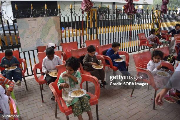 In the Karachi FootPath School,All Children get lunch for free before they leave at 1.00 pm. Pakistan is a country with the lowest education...