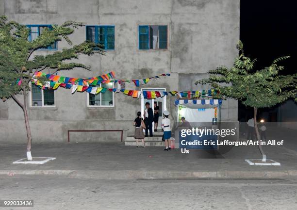 Little shop in front of a building at night, Pyongan Province, Pyongyang, North Korea on September 9, 2008 in Pyongyang, North Korea.