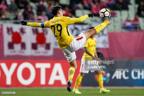 Gao Lin of Guangzhou Evergrande stops the ball during the AFC Champions League Group G match between Cerezo Osaka and Guangzhou Evergrande at the...