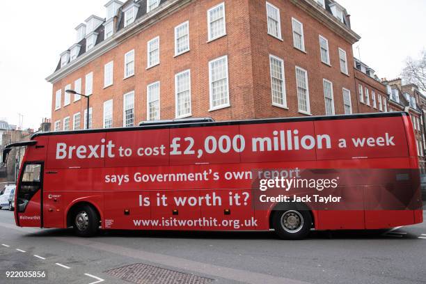 An anti-Brexit campaign battle bus drives through Westminster on February 21, 2018 in London, England. The crowd-funded coach is to tour the country...