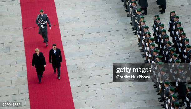 German Chancellor Angela Merkel and Prime Minister of Macedonia Zoran Zaev review the guard of honour at the Chancellery in Berlin, Germany on...