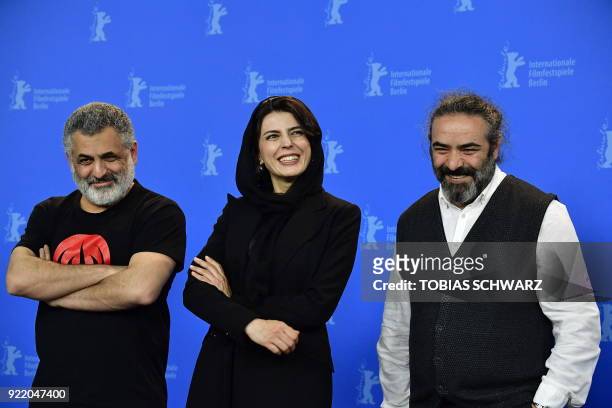 Iranian producer Mani Haghighi , Iranian actress Leila Hatami and actor Hasan Majuni pose during the photo call for the film "Pig" presented in...