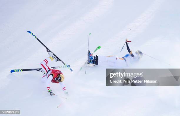 Christoph Wahrstoetter of Austria and Erik Mobaerg of Sweden crashes during the Mens Skicross Finals at Phoenix Snow Park on February 21, 2018 in...