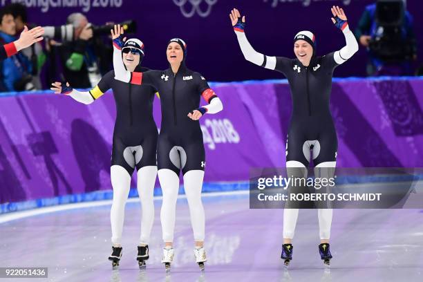 S Mia Manganello, USA's Brittany Bowe, and USA's Heather Bergsma celebrate after competing in the women's team pursuit final B speed skating event...