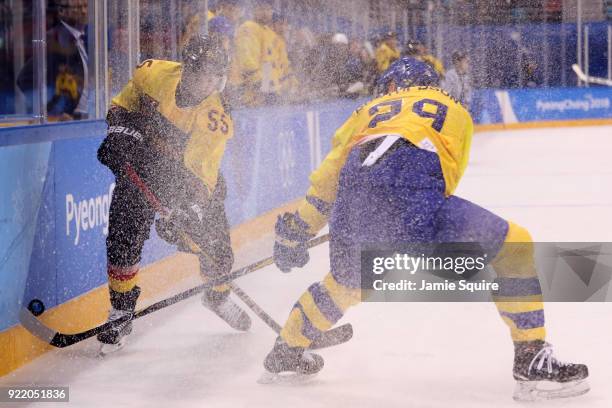 Felix Schutz of Germany skates against Erik Gustafsson of Sweden during the Men's Play-offs Quarterfinals game on day twelve of the PyeongChang 2018...