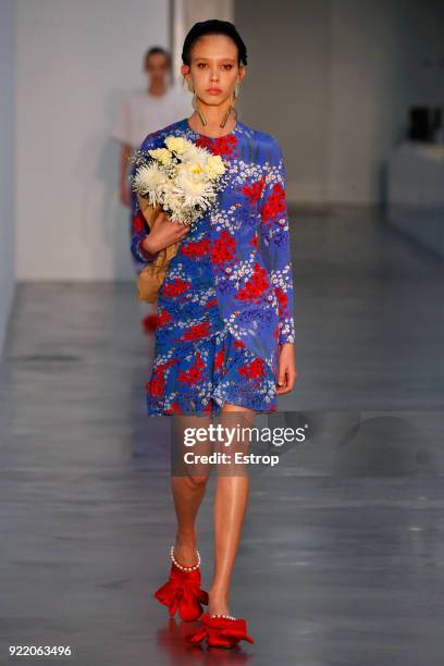 Model walks the runway at the Mother of Pearl show during London Fashion Week February 2018 at Newport Street Gallery on February 19, 2018 in London,...