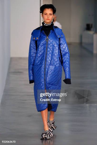 Model walks the runway at the Mother of Pearl show during London Fashion Week February 2018 at Newport Street Gallery on February 19, 2018 in London,...