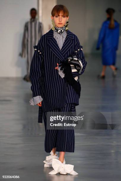 Model walks the runway at the Mother of Pearl show during London Fashion Week February 2018 at Newport Street Gallery on February 19, 2018 in London,...