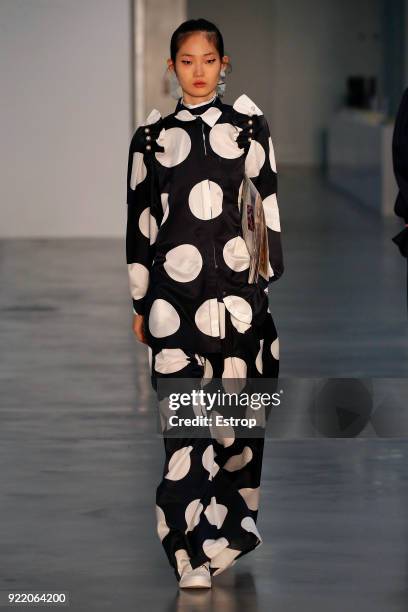 Model walks the runway at the Mother of Pearl show during London Fashion Week February 2018 at Newport Street Gallery on February 19, 2018 in London,...