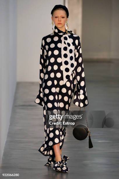 Model walks the runway at the Mother of Pearl show during London Fashion Week February 2018 at Newport Street Gallery on February 19, 2018 in London,...