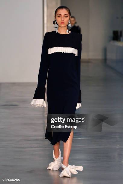 Model walks the runway at the Mother of Pearl show during London Fashion Week February 2018 at Newport Street Gallery on February 19, 2018 in London,...