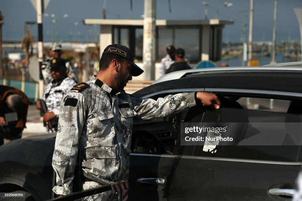 Hamas security forces stop a vehicle at a security checkpoint in Gaza