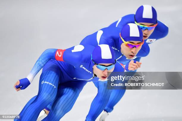 South Korea's Joo Hyong-Jun, South Korea's Lee Seung-Hoon and South Korea's Kim Min Seok compete in the men's team pursuit final A speed skating...