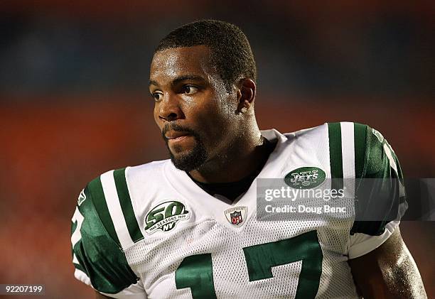 Wide receiver Braylon Edwards of the New York Jets goes through warm-ups on the field before taking on the Miami Dolphins at Land Shark Stadium on...
