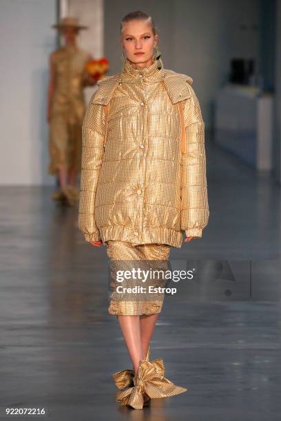 Model walks the runway at the Mother of Pearl show during London Fashion Week February 2018 at Newport Street Gallery on February 19, 2018 in London,...