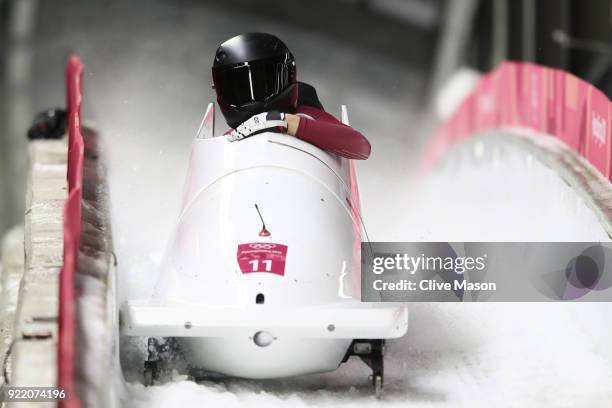 Nadezhda Sergeeva and Anastasia Kocherzhova of Olympic Athlete from Russia react in the finish area during the Women's Bobsleigh heats on day twelve...