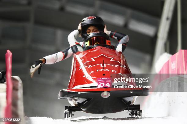 Kaillie Humphries and Phylicia George of Canada celebrate in the finish area during the Women's Bobsleigh heats on day twelve of the PyeongChang 2018...